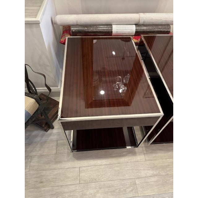 This is a pair of Bolier and Company lacquered side tables/nightstands. These are made of exotic wood with a lacquered...