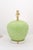 A bold pair of Mid-Century green ceramic artichoke lamps with brushed brass hardware and round lucite bases. The bases are...