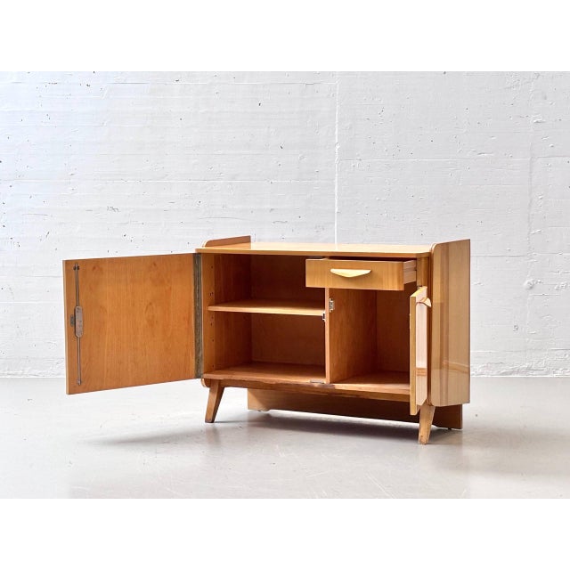 A characterful mid-century television cabinet from the former czechoslovakia, manufactured in the 1960s. The original...