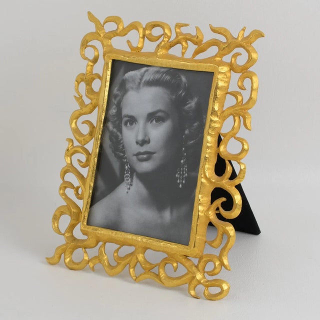This exquisite gilt metal picture photo frame by French designer Edouard Rambaud is the perfect piece to showcase your...