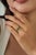 This cluster ring features 1 carat of marquise-cut emeralds set in 14K yellow gold. The emerald measuring 3 x 5.5 mm,...