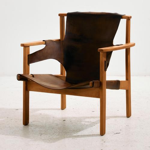 The ‘Trienna’ armchair designed by Carl-Axel Acking for Nordiska Kompaniet in the 1950s. The beech surface of the chair...