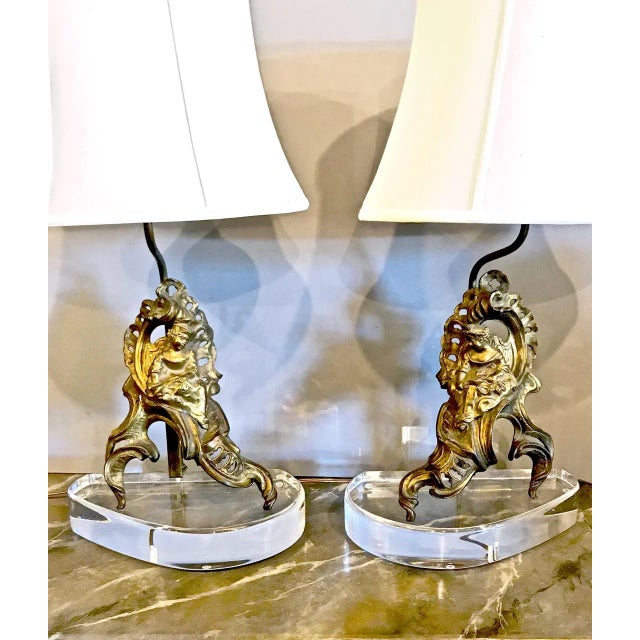 This a charming pair of 18th c. French Bonze chenets depicting pastoral maids. The chenets retain traces of their original...