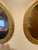 Pair Italian gilt oval mirrors. Each mirror is 11.5" high x 9.5" wide x 1" deep. Wire on back for hanging. Good overall...