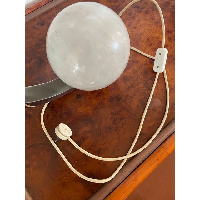 Pair of nickel-plated brass lamps with a Carrara marble sphere by Fratelli Banci Firenze, produced in 1970. Very elegant,...