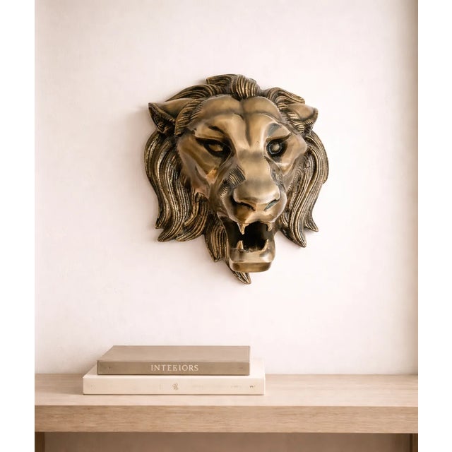 Upgrade your home décor with this stunning antique-style lion head wall mount, crafted from real metal and finished in a...