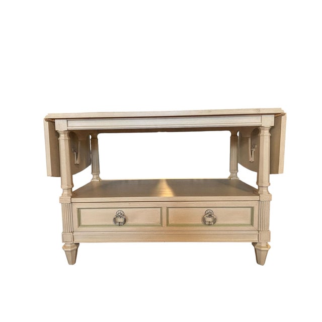 Elegant vintage Thomasville drop-leaf server dating to 1972, retaining an interior retailer tag from Belk Bros. Company of...