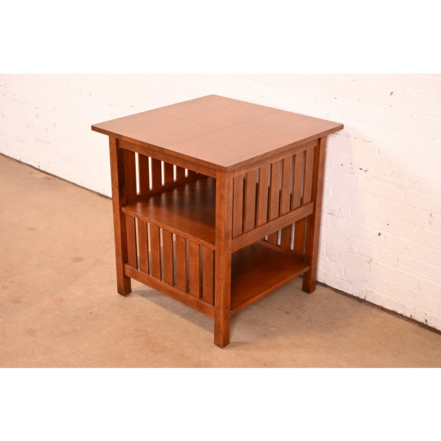 An exceptional Mission or Arts & Crafts style three-tier spindle side table or end table By L. & J.G. Stickley USA, 2001...