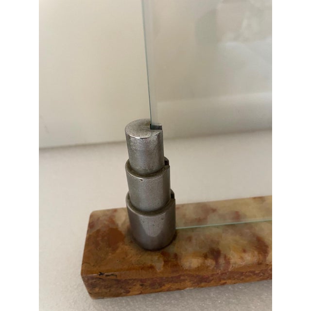 A small piece of the glass was damaged, but once placed in the supports, it was no longer visible.