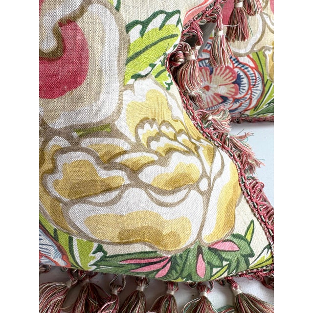 This is a dynamic pair of hand printed tasseled linen pillows. These vibrant pillows have gorgeous tones of bright pink,...
