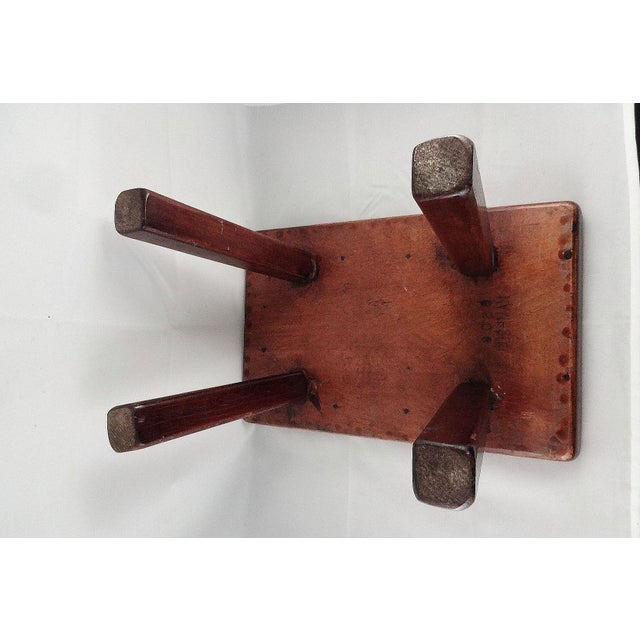 Vintage maple 'cricket foot stool', handcrafted by H.T. Cushman Manufacturing Co. Style number 9038. The stool was made...