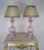 An elegant pair of vintage Murano glass table lamps, handcrafted in Italy in the mid-20th century. Each lamp features a...