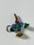 Handmade vintage beaded tropical bird of Paradise figurine as key chain locket.
