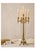 A beautifully detailed antique French five-light candelabra featuring a fluted column, draped chains, scrolling arms, and...