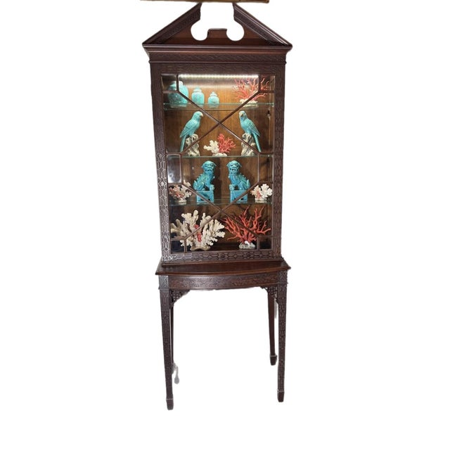 A neat little Chinese Chippendale display cabinet. Of rare size and a strong impact all filled up with your lovely...