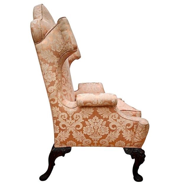On offer is a Queen Anne-style wingback armchair, a classic example of early 18th-century English design. If it looks like...