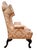 On offer is a Queen Anne-style wingback armchair, a classic example of early 18th-century English design. If it looks like...