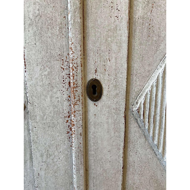 19th-c. Swedish Gustavian Painted Sideboard Pale, time-worn grey paint showcases the crisp neoclassical lines of this...