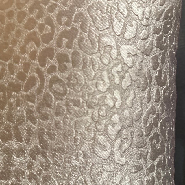 Decorative double sided pillow cover, handcrafted from champagne animal print fabric, 16”X16”, featuring a secure hidden...