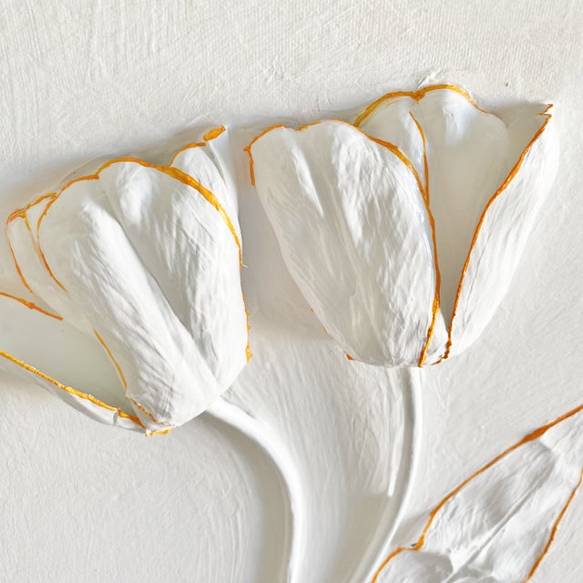 Add a touch of timeless elegance to your home with this original textured floral relief artwork by artist Tatiana...