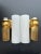 The Corbett Lighting Ronda wall sconces feature a fluted vintage brass body and matte cloud glass shade inspired by...