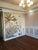 Luxury artisan hand-painted panoramic tropical jungle chinoiserie mural set finished in elegant muted monochrome tones....
