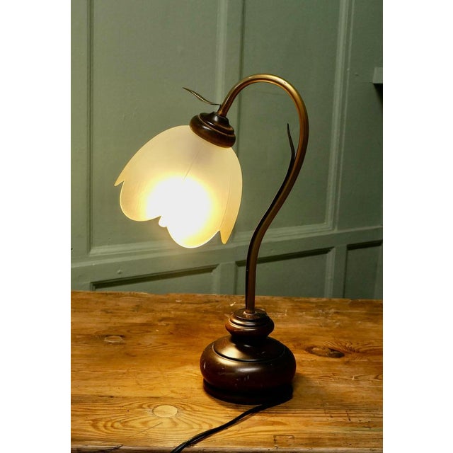 French Bronze Toleware Conservatory Table Lamp The lamp stands on a round wooden base and this supports a swan neck...