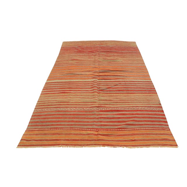 Handwoven vintage striped kilim rug from Denizli region of Turkey. Approximatelly 45-55 years old. In very good condition.