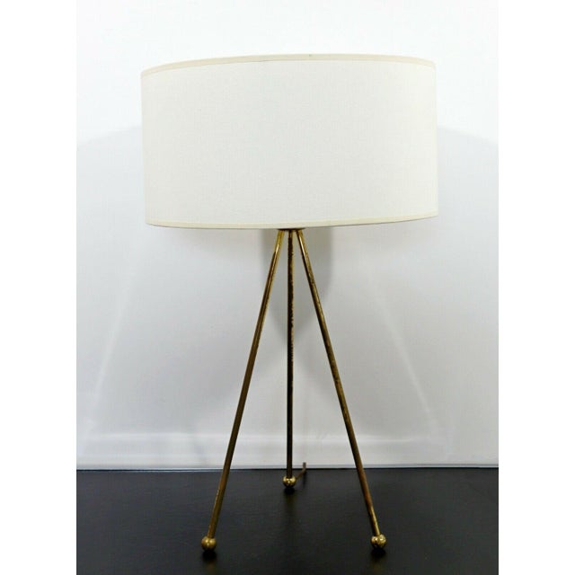 For your consideration is a gorgeous table lamp, on three elgs and with its original shade and finial, circa the 1960s. In...