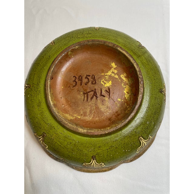 Vintage Florentine Terra Cotta Bowl is hand pained gold, green and white with leaf and diamond design. Scalloped top...
