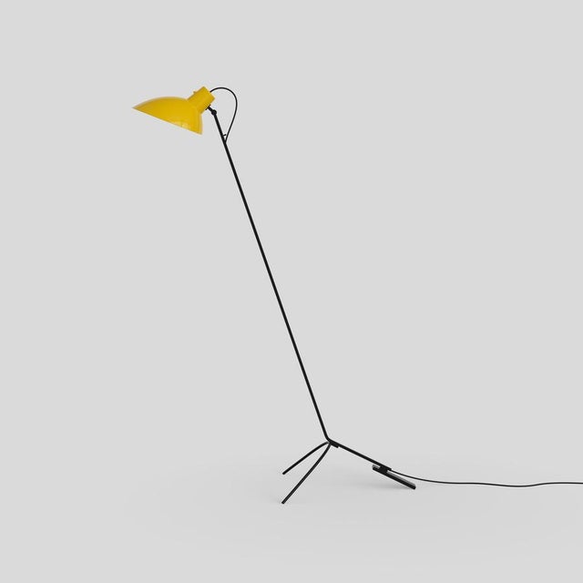 Vv cinquanta floor lamp. design by vittoriano viganò. this version is with yellow lacquered reflector and black frame. the...