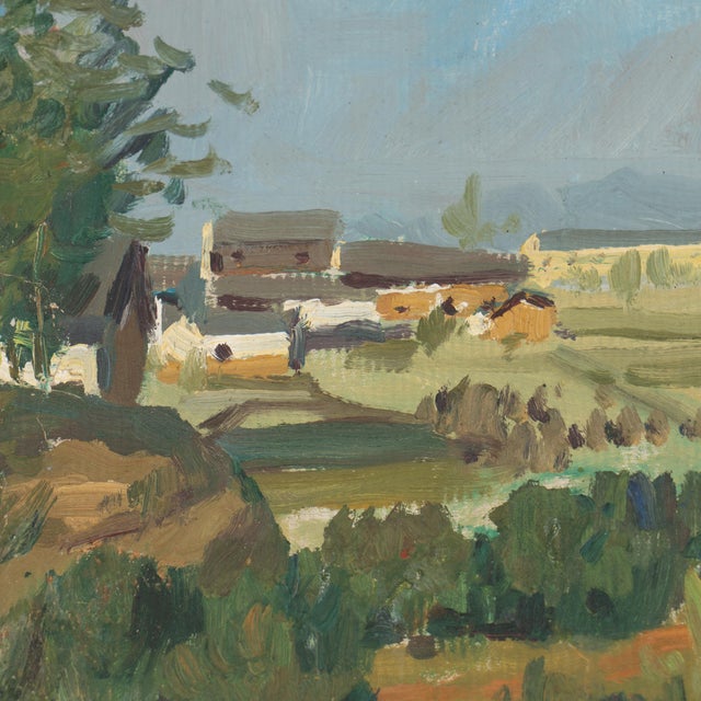An early 20th-century landscape in oil on paper, painted en plein air from a wooded hillside looking out over open fields...