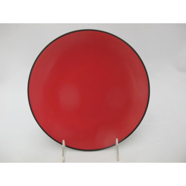 Modern and sleek, Gump's pottery salad plate set of 4 in red and black Worldview pattern. Red at top, black at base. Each...