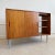 Custom designed by Edward Wormley for Dunbar this cleverly designed walnut credenza, sideboard, room divider has 3 sliding...
