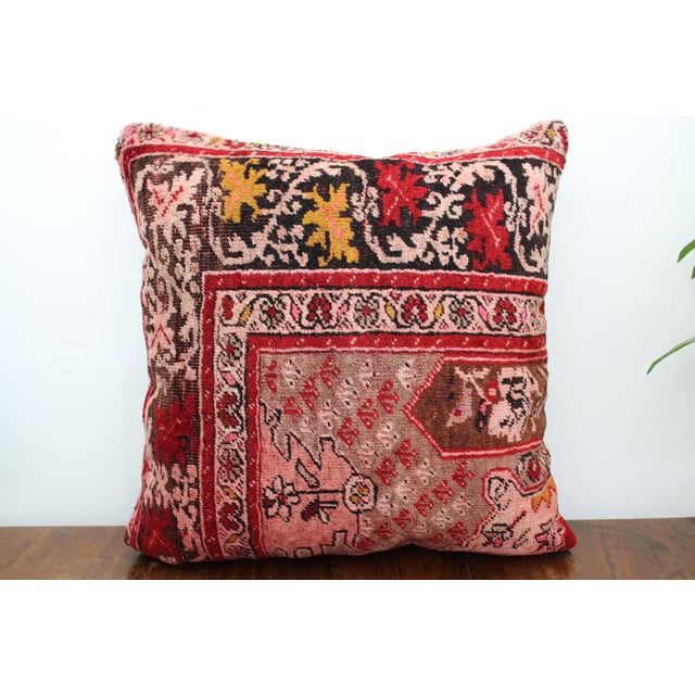 This Turkish pillow cover is made from the highest quality antique rug in 100% wool on the front. The back is covered in...