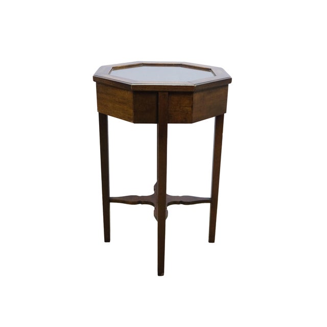 Vintage Brandt Furniture curio display showcase table. Made of Ancestry Mahogany featuring octagonal form with four...