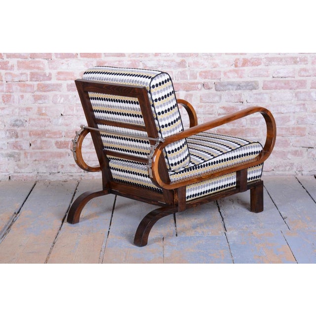 This luxurious Art Deco pair of adjustable armchairs is an iconic piece from the early 20th century, designed by the...