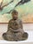 Striking vintage mid-century Japanese cast iron Buddha statue, imported by the Otagiri Mercantile Company (OMC).Crafted in...