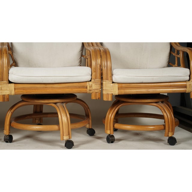 Set of Four Vintage Coastal Rattan Swivel Lounge Chairs on Casters With Original Cushions For Sale In Los Angeles - Image 6 of 7