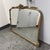 Design Plus Gallery presents a Vintage Rococo Revival Gilt Framed Wall Mirror. The rectangular mirror has softly rounded...