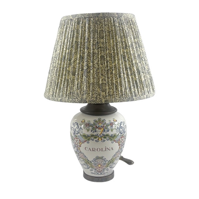 Delft Tobacco jar depicting Carolina now made into lamp. Size: 13" to base of lamp by 9" diameter.