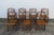 This Set of Seven Dining Chairs is made out of wood, and bamboo. The chairs fold and it make it a great set for a small...