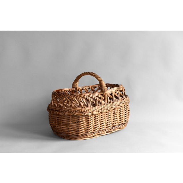 Generous size wicker basket. Circa 1930