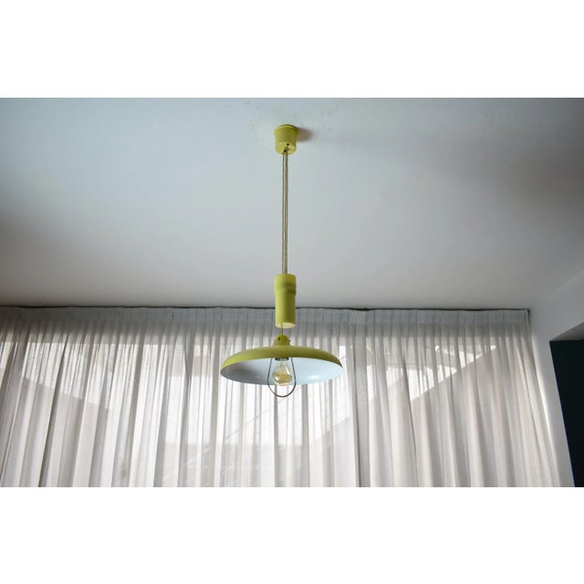 A fantastic 20th-century vintage pendant by collectible Italian manufacturer Stilux Milano which adjusts in weight via its...