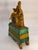 A handsome French Charles X period mantel clock combining richly figured green malachite with finely cast and chased gilt...