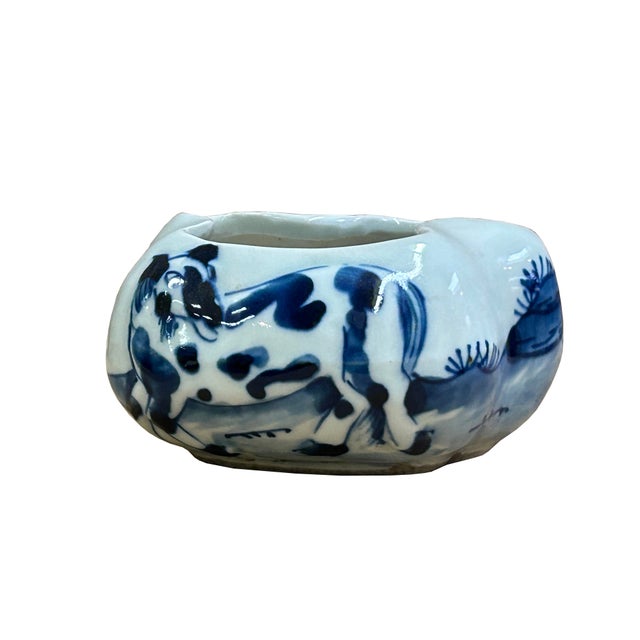 This exquisite antique blue and white ceramic brush washer is delicately hand-painted with a charming landscape scene...