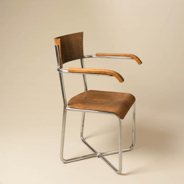 The chair is very elegant and in its original condition.