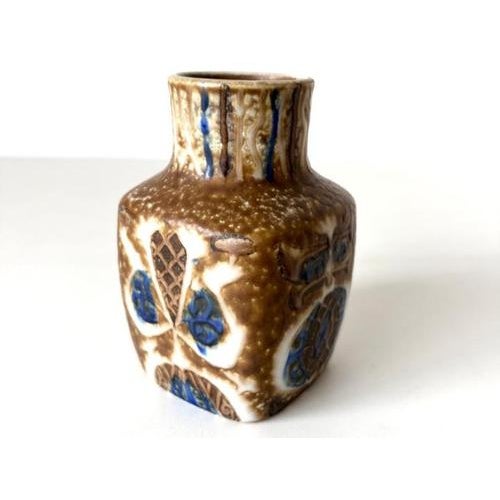 Scandinavian ceramic piece by Nils Thorsson for Royal Copenhagen. A small, square-shaped vase featuring the "Baca"...