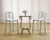 An iconic pair of "Navy" barstools finished in hand-brushed aluminum made by Emeco in the United States. Designed in 1944...