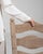 A cohesive set of dining chairs crafted from oak, featuring simple lines and durable construction. Designed for everyday...